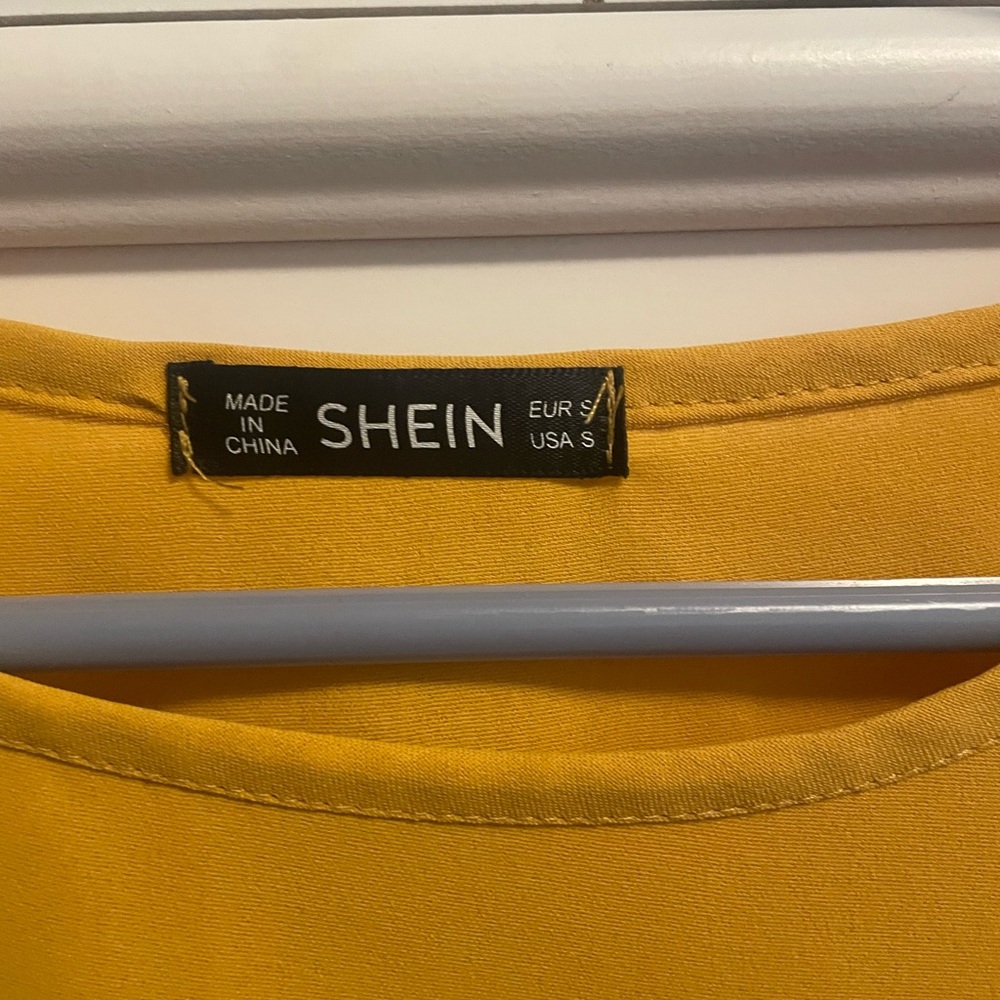 **Buy 4 Get 1 Free. $5 times only!  Flutter Sleeve Ruffled Blouse - Picture 2 of 3